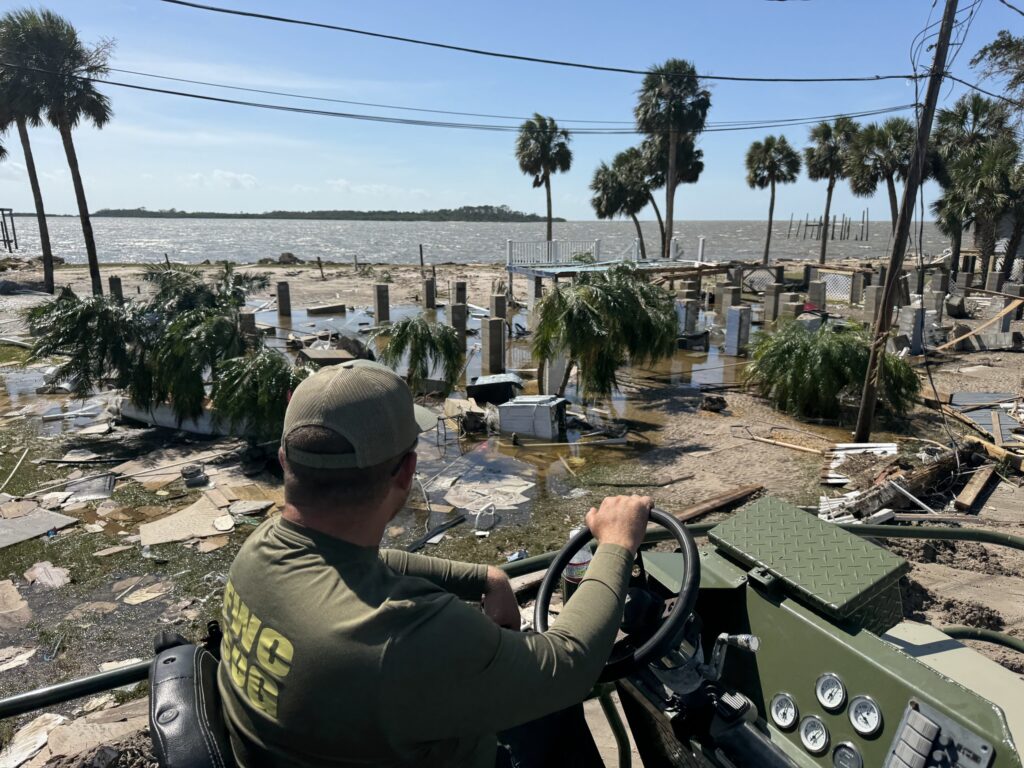 FWC officer surveys damage as a result of Hurricane Helene. Image Credit - Florida Fish and Wildlife